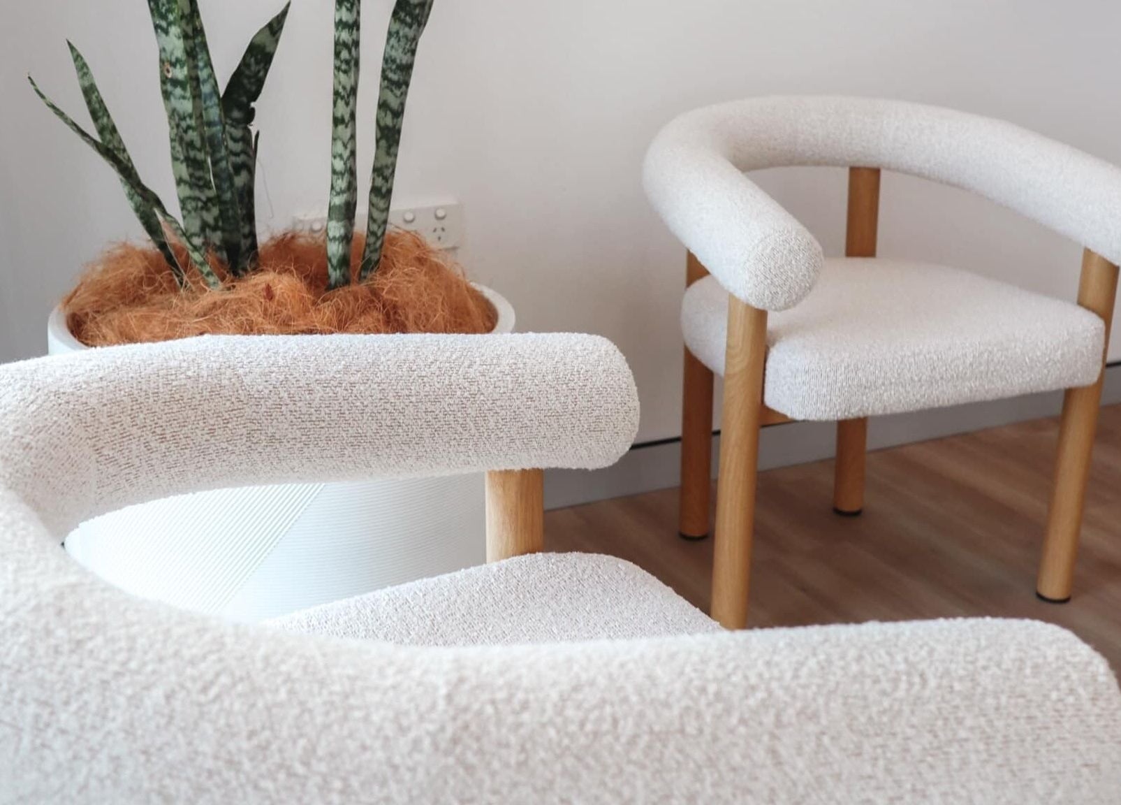 Elegant chairs and plant decor in Lily Me Red IPSWICH, North Ipswich, Queensland, AU.