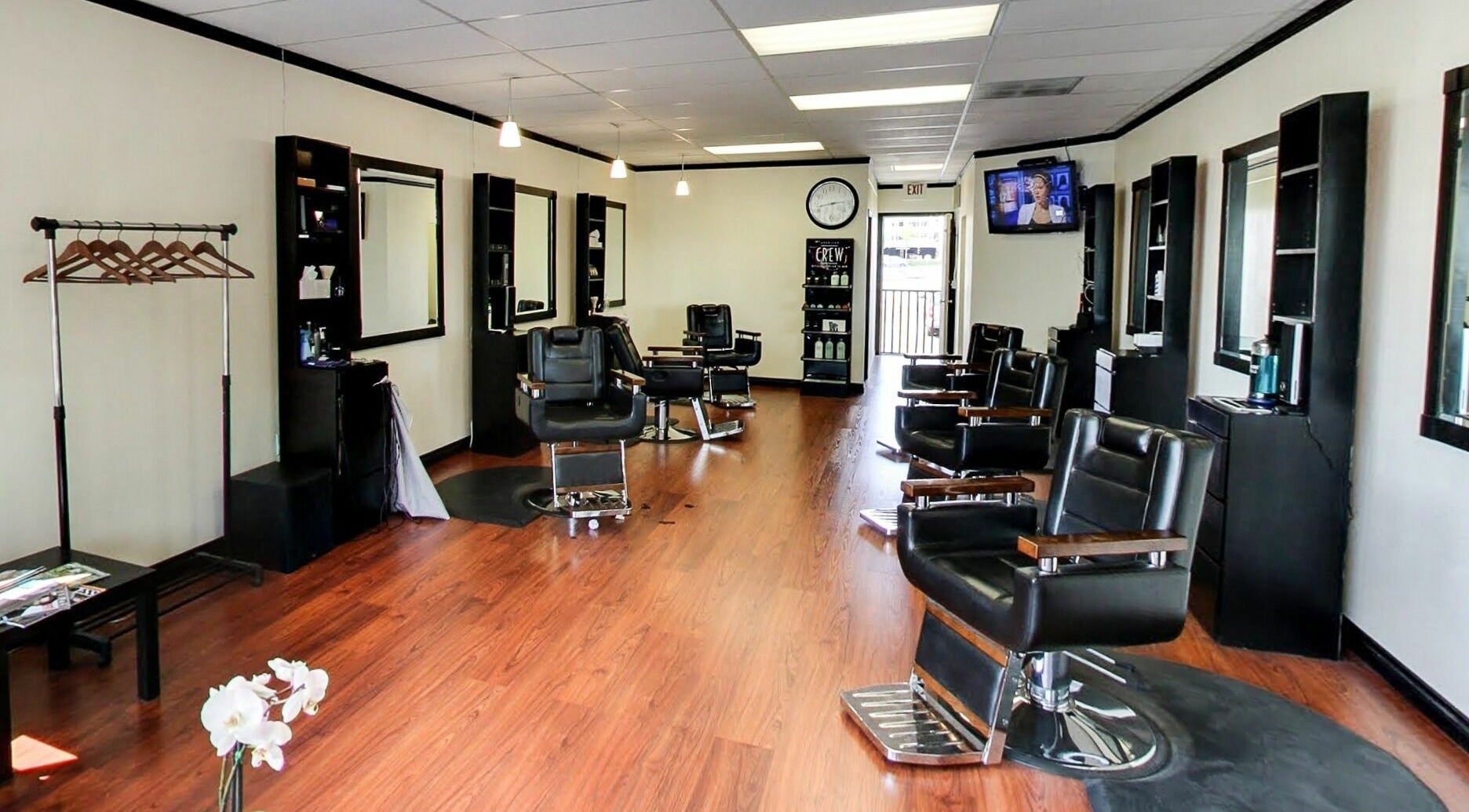 Modern interior of Bach's Barbershop in Bellevue, Washington, US featuring stylish barber chairs and sleek decor.