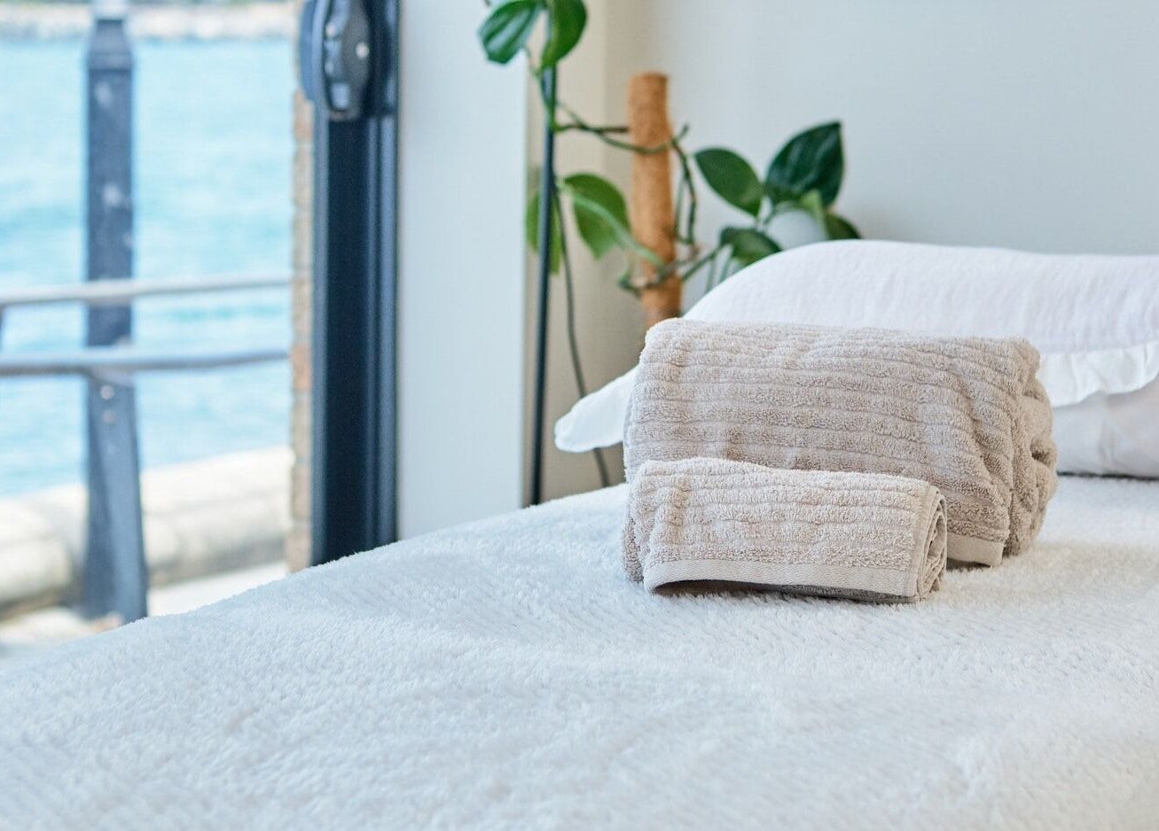 Relaxing massage table with folded towels at My Balance Massage, Withers, Western Australia, AU.