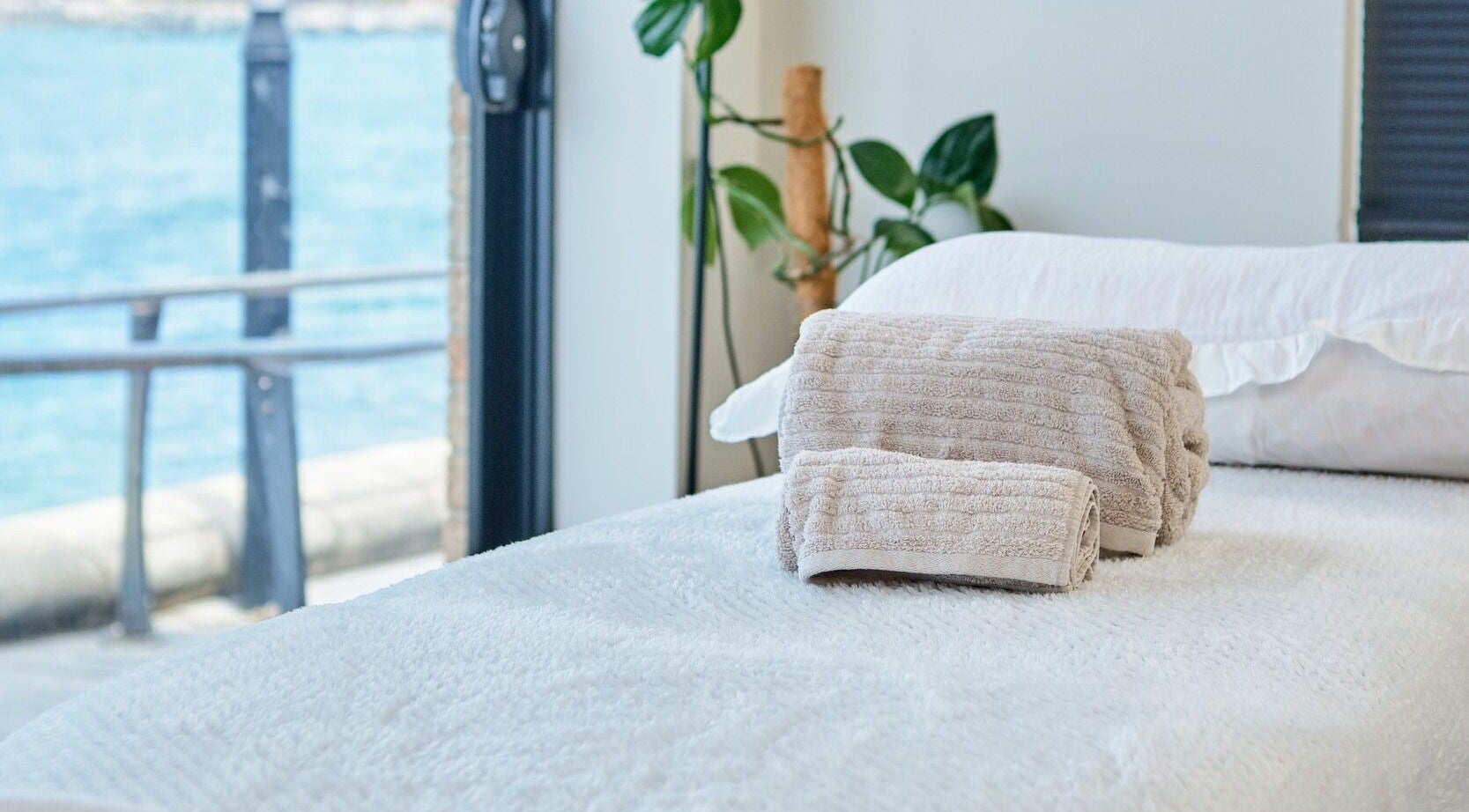 Relaxing massage table with folded towels at My Balance Massage, Withers, Western Australia, AU.
