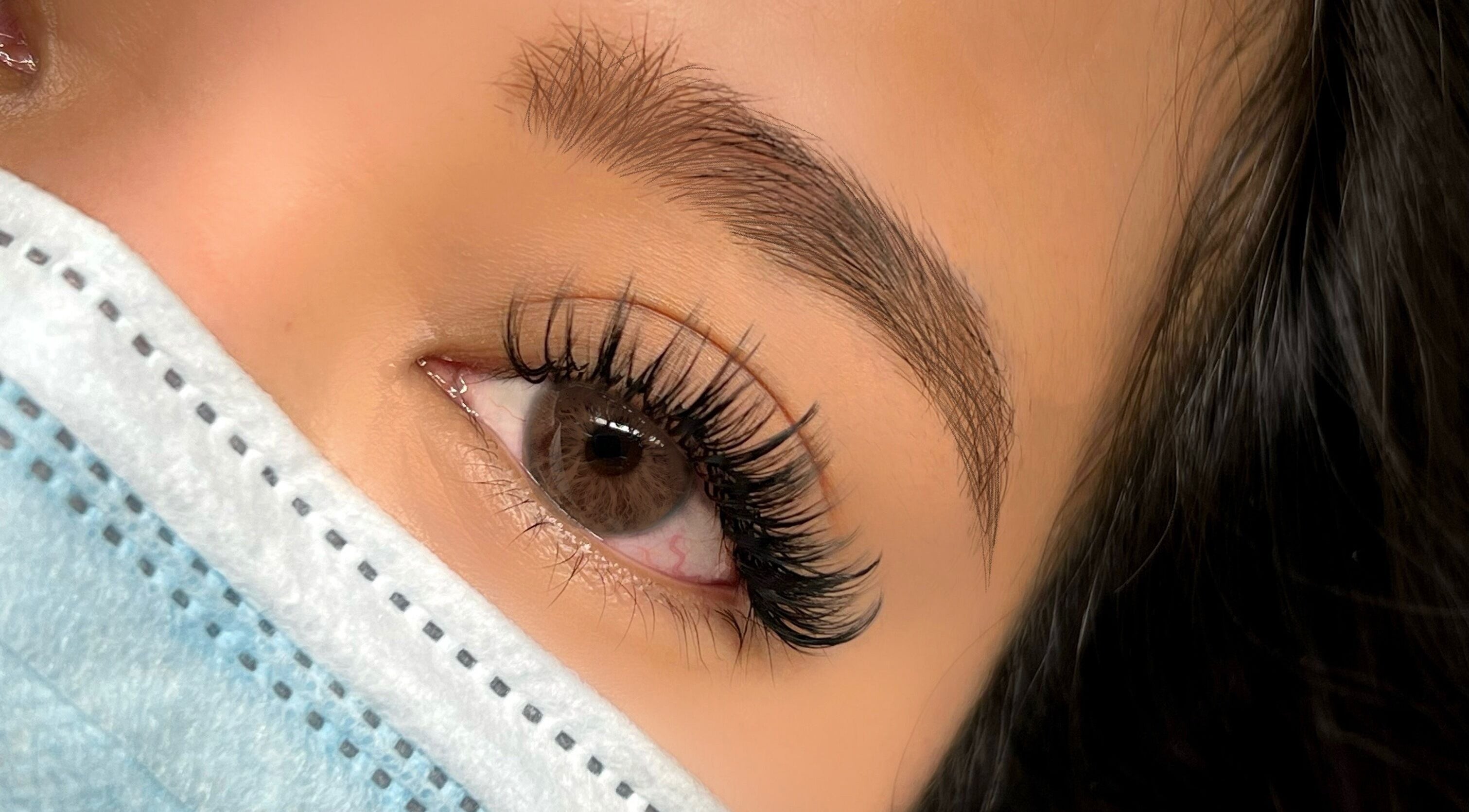 Close-up of elegant eyelash extensions at Cara Lash Studios in Toronto, Ontario, CA, showcasing exquisite styling.