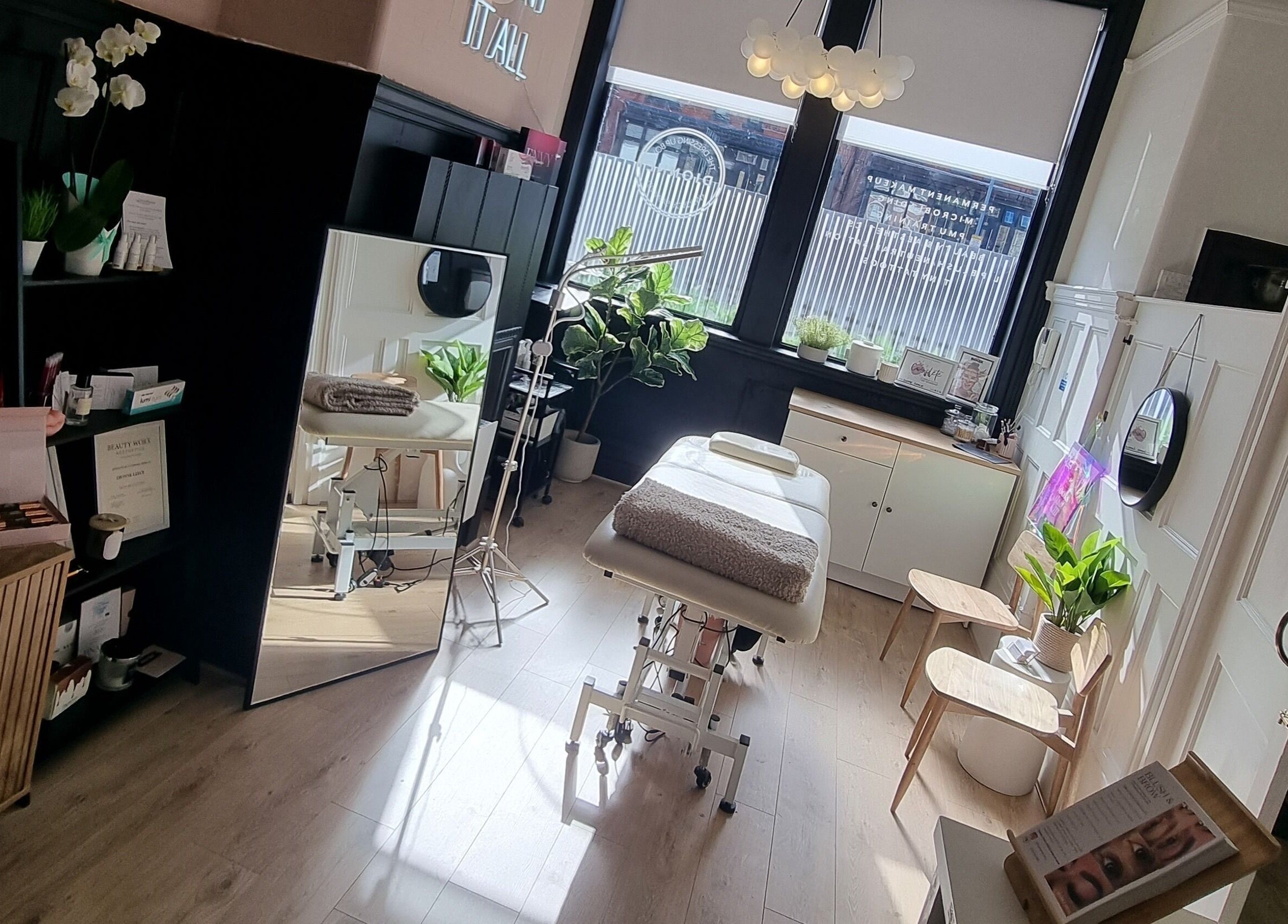 View of Dionne The Dressing Up Box Permanent Makeup & Training Academy in Bolton, England, showcasing a serene salon interior.