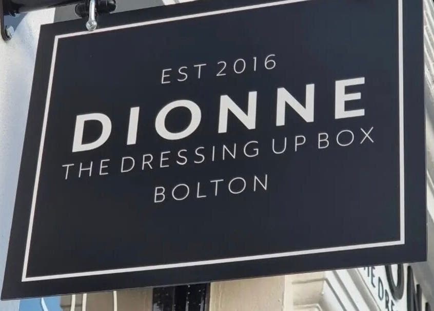Sign of Dionne The Dressing Up Box Permanent Makeup & Training Academy in Bolton, England, GB.