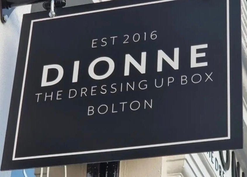 Sign of Dionne The Dressing Up Box Permanent Makeup & Training Academy in Bolton, England, GB.