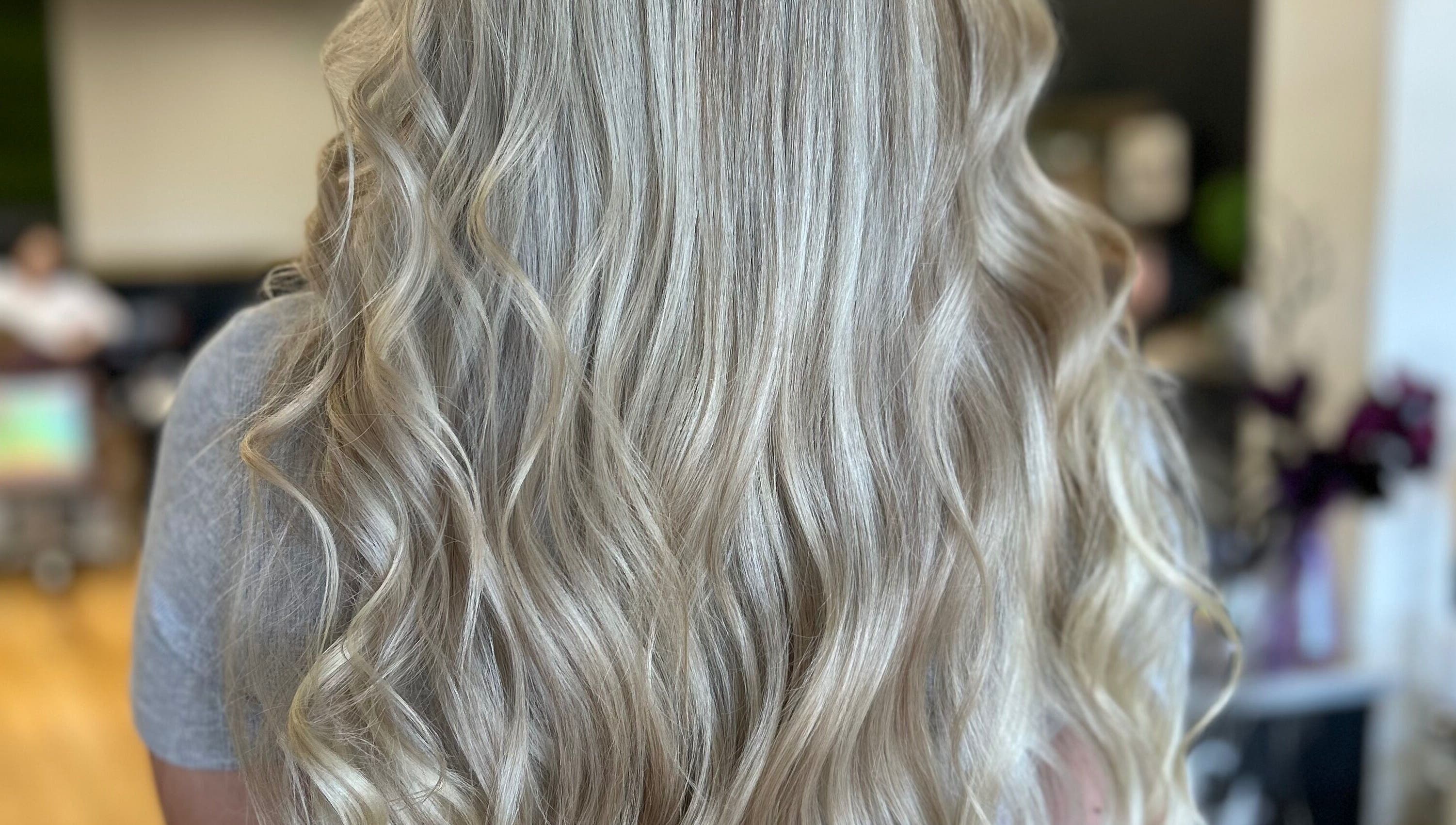 Blonde wavy hair styled at The Craft Salon by Tara Lauren in New Smyrna Beach, Florida, US.