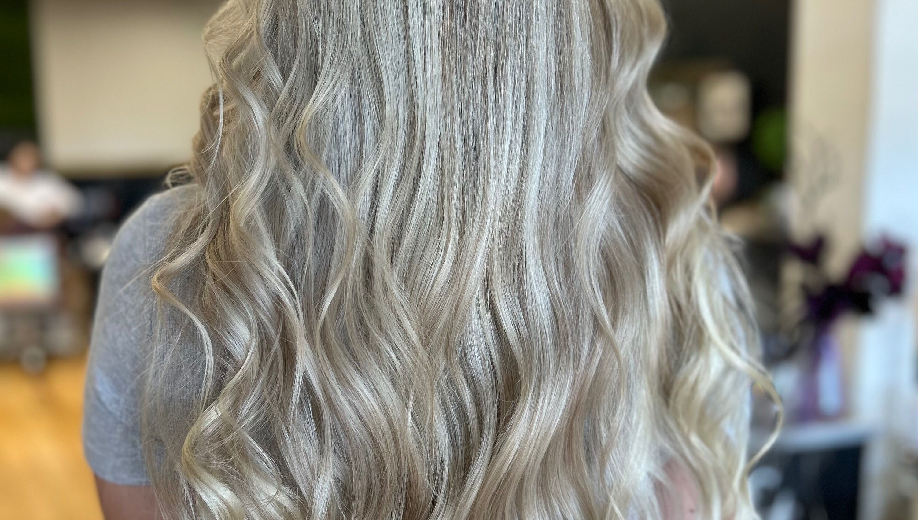 Blonde wavy hair styled at The Craft Salon by Tara Lauren in New Smyrna Beach, Florida, US.