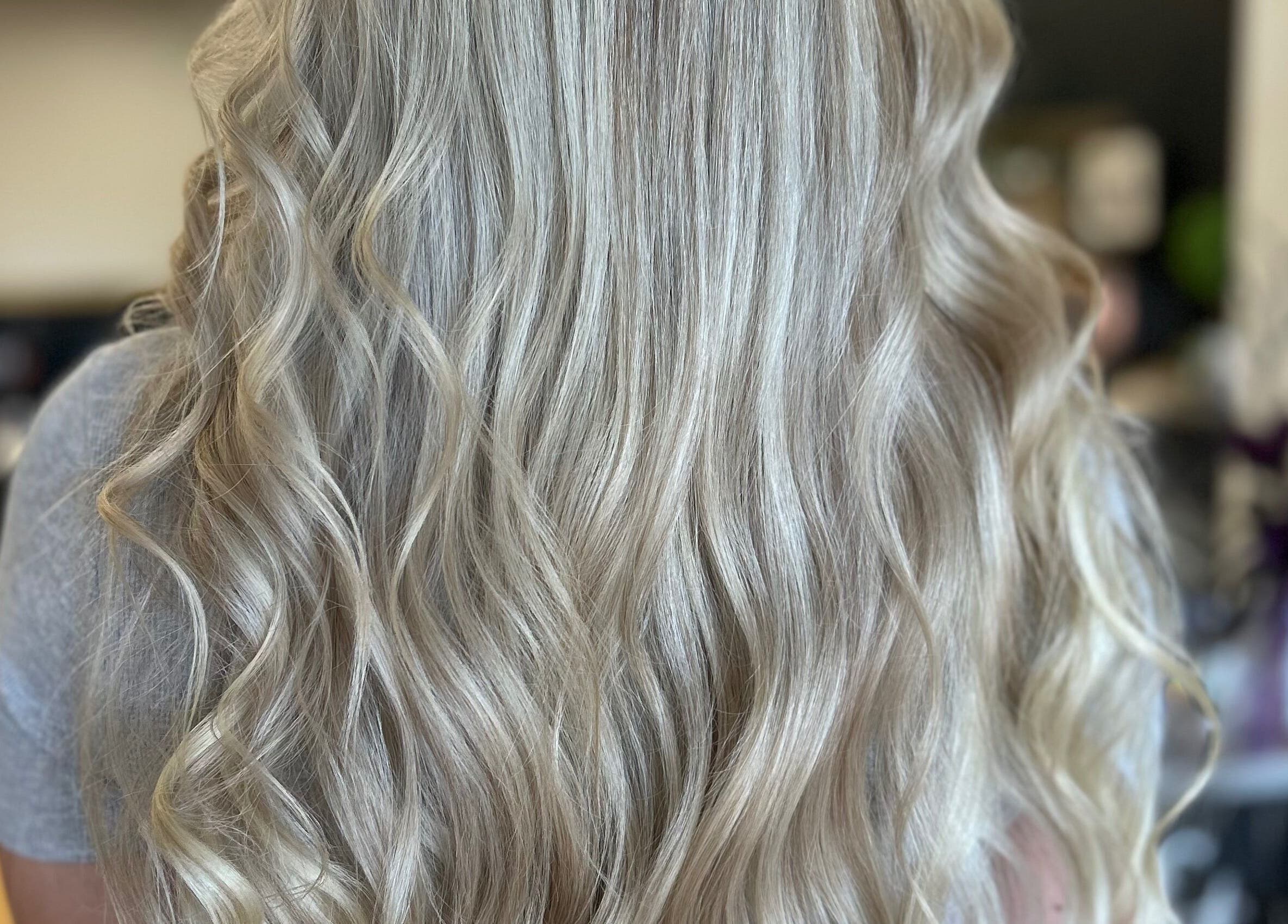 Blonde wavy hair styled at The Craft Salon by Tara Lauren in New Smyrna Beach, Florida, US.