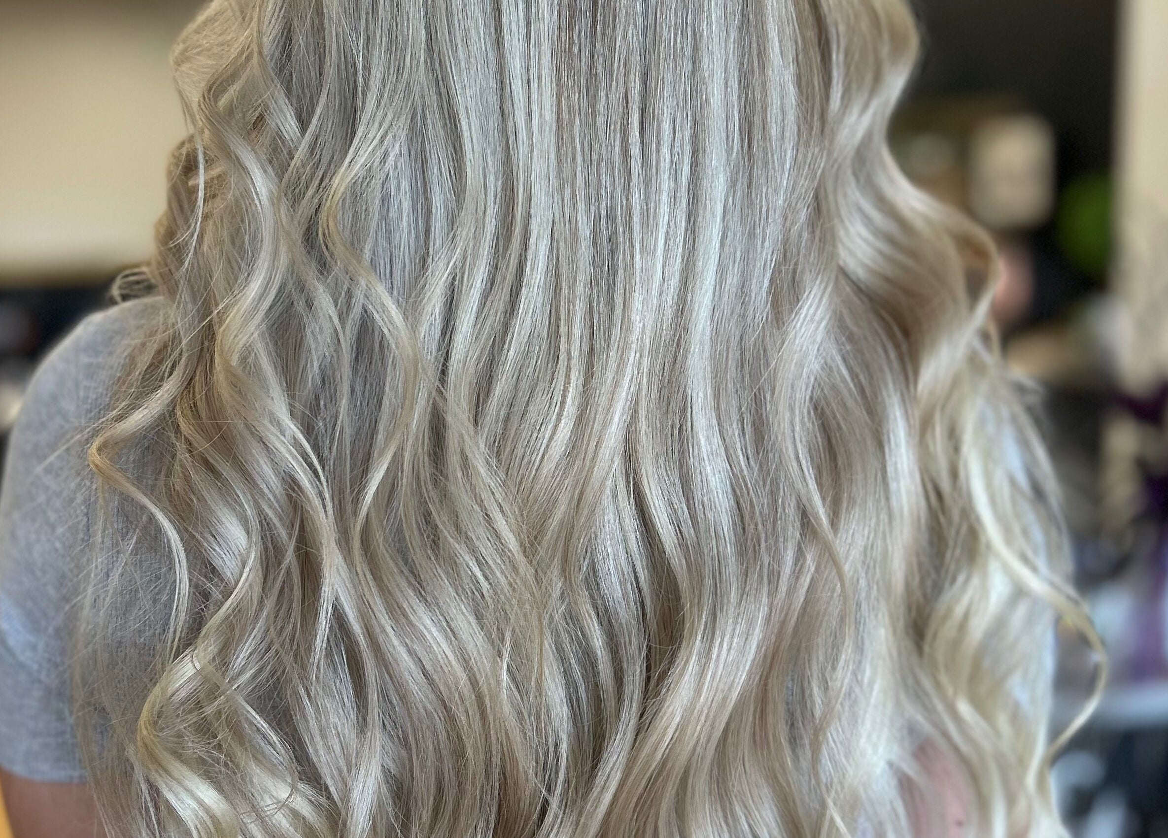 Blonde wavy hair styled at The Craft Salon by Tara Lauren in New Smyrna Beach, Florida, US.