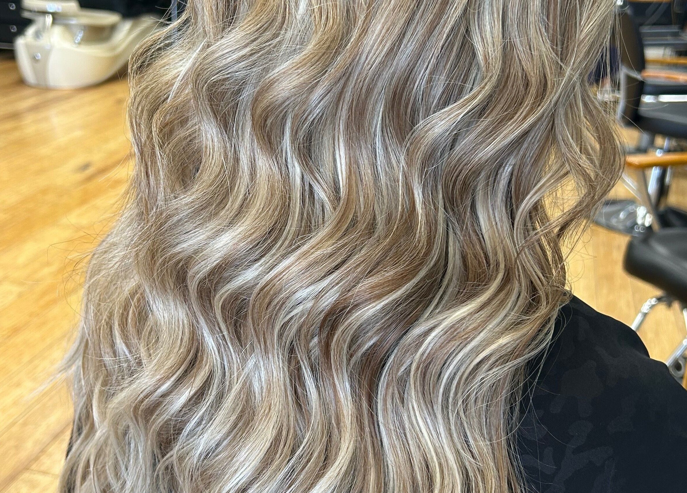 Elegant blonde waves created at The Craft Salon by Tara Lauren, New Smyrna Beach, Florida, US.