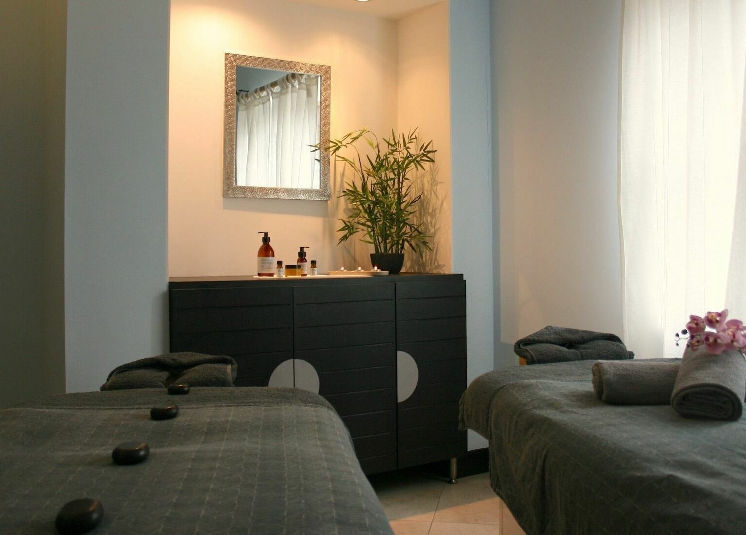 Relaxing massage room at The Spa at St Giles, Norwich, England, GB, with soothing decor and luxurious amenities.