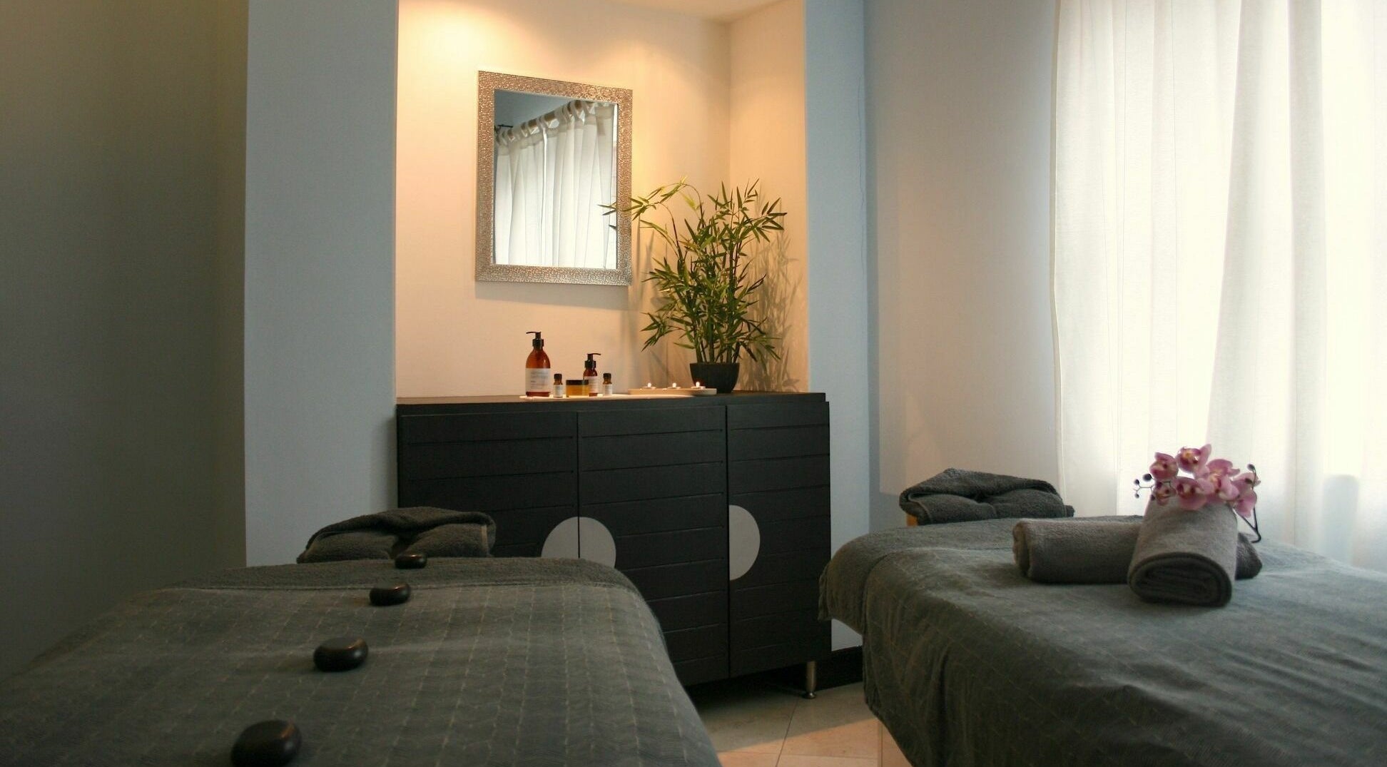 Relaxing massage room at The Spa at St Giles, Norwich, England, GB, with soothing decor and luxurious amenities.