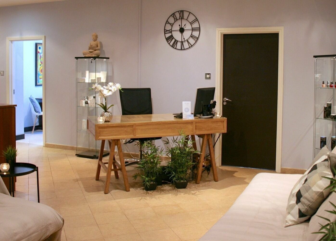 Reception area at The Spa at St Giles, Norwich, England, GB with a wooden desk and serene decor.