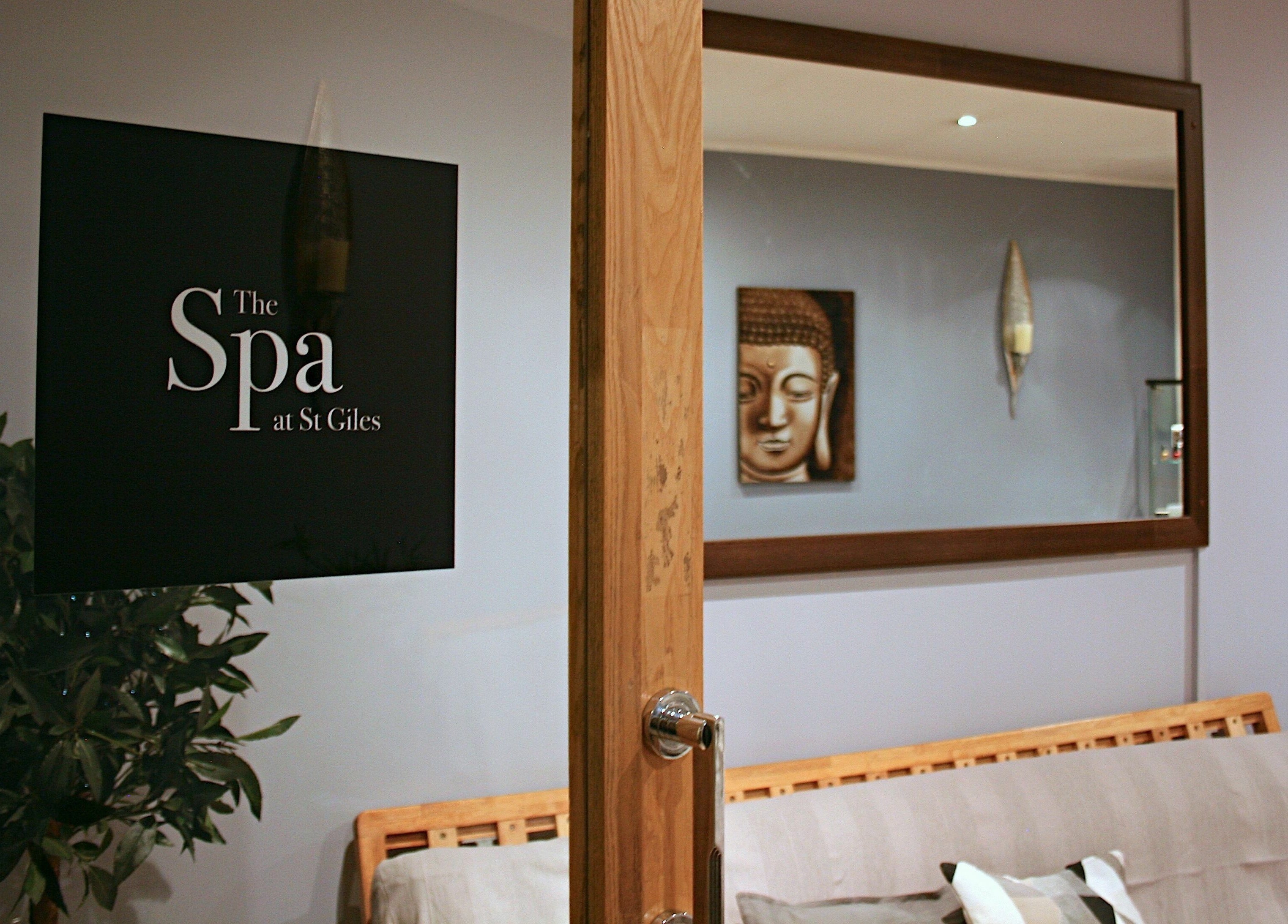 Entrance to The Spa at St Giles in Norwich, England, GB with soothing decor including a Buddha artwork.
