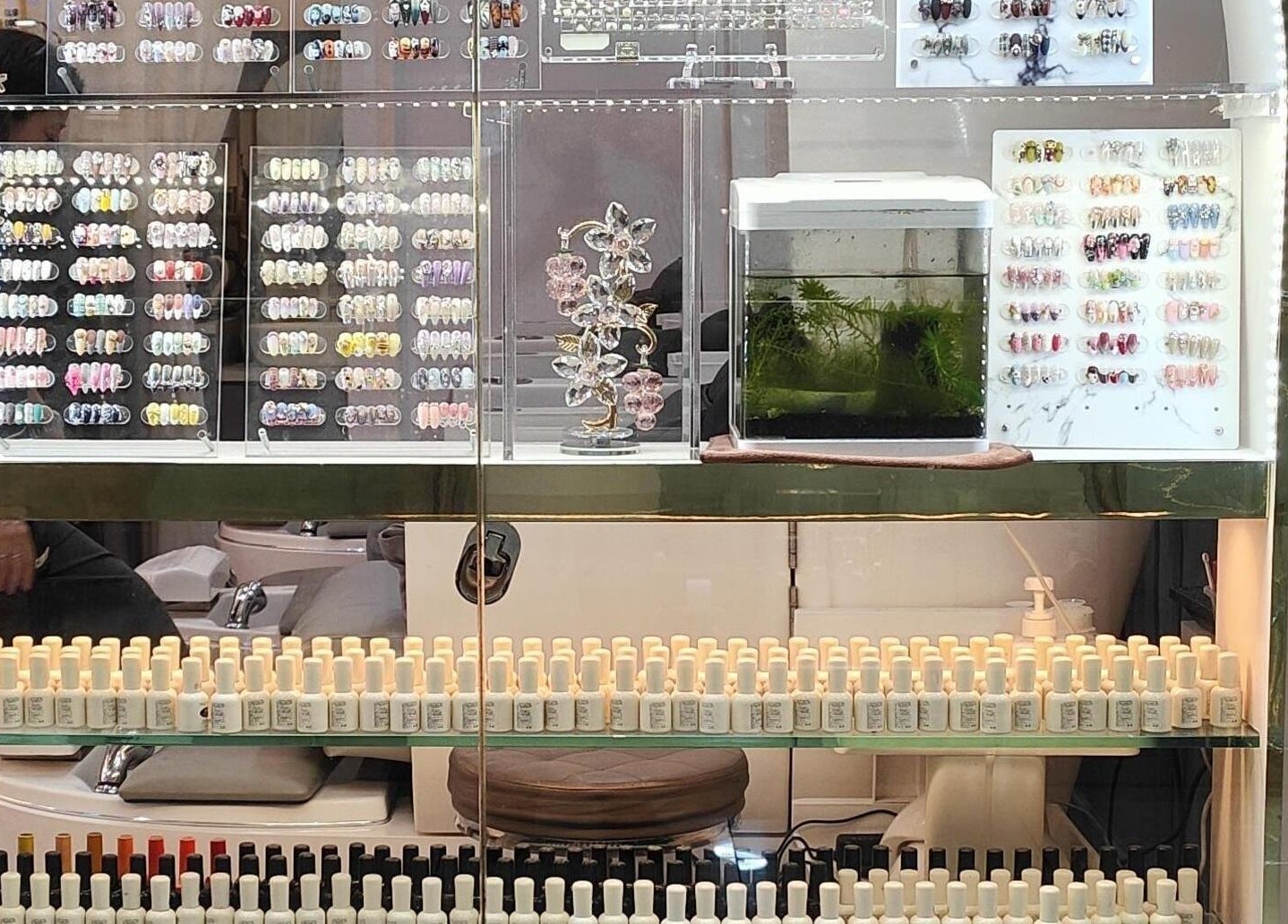 Colorful nail art display at Finger Bar and Studio, Singapore, Singapore, SG. Showcasing a wide range of nail designs.