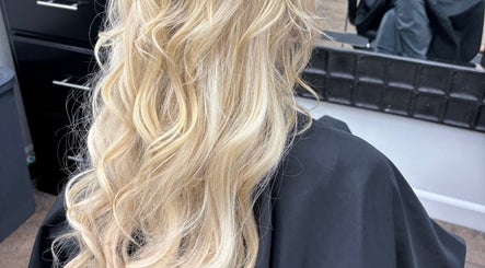 Elegant blonde waves styled at Hair by Angelia Chandler Austin in Jonesboro, Arkansas, US.