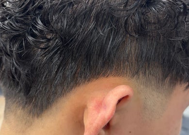 Close-up of a sleek fade haircut at Hair by Angelia Chandler Austin, Jonesboro, Arkansas, US.