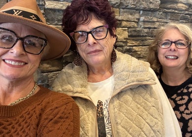 Three happy women at Hair by Angelia Chandler Austin, Jonesboro, Arkansas, US, showcasing trendy hairstyles.