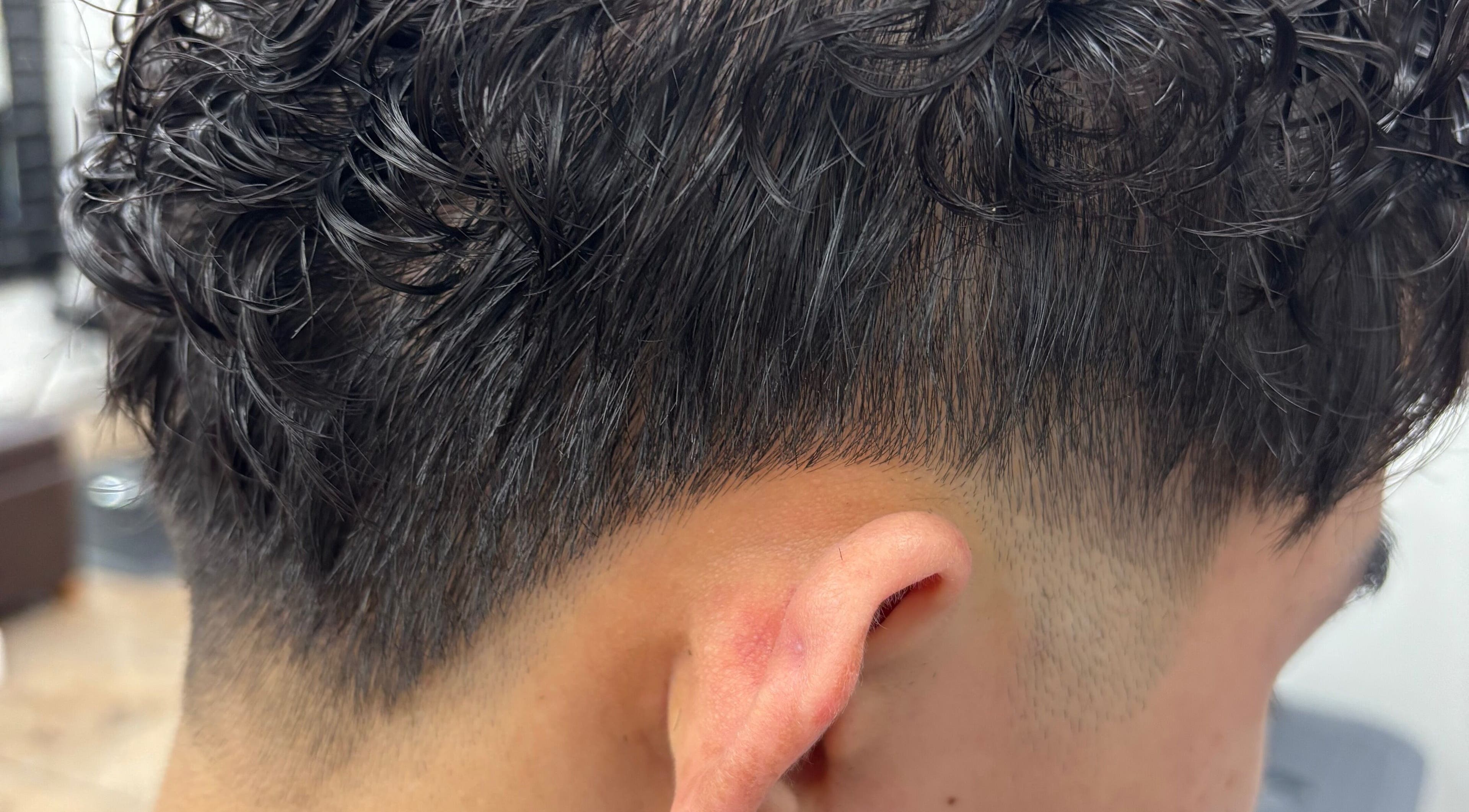 Close-up of a textured fade haircut at Hair by Angelia Chandler-Austin, Jonesboro, Arkansas, US.