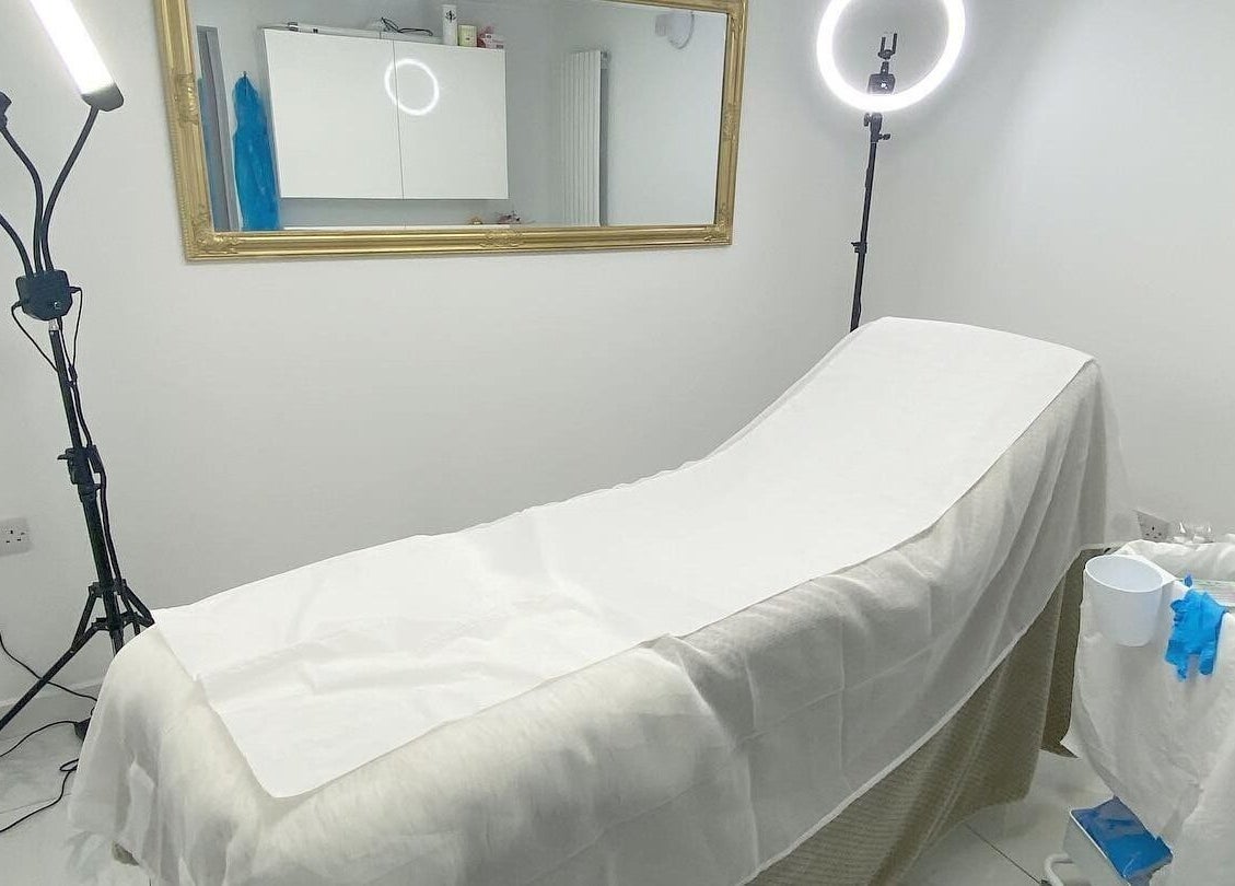 Serene treatment room at Atlas Cosmetics Clinic - Lytham St Annes, Lytham St Anne’s, England, GB with essential equipment.