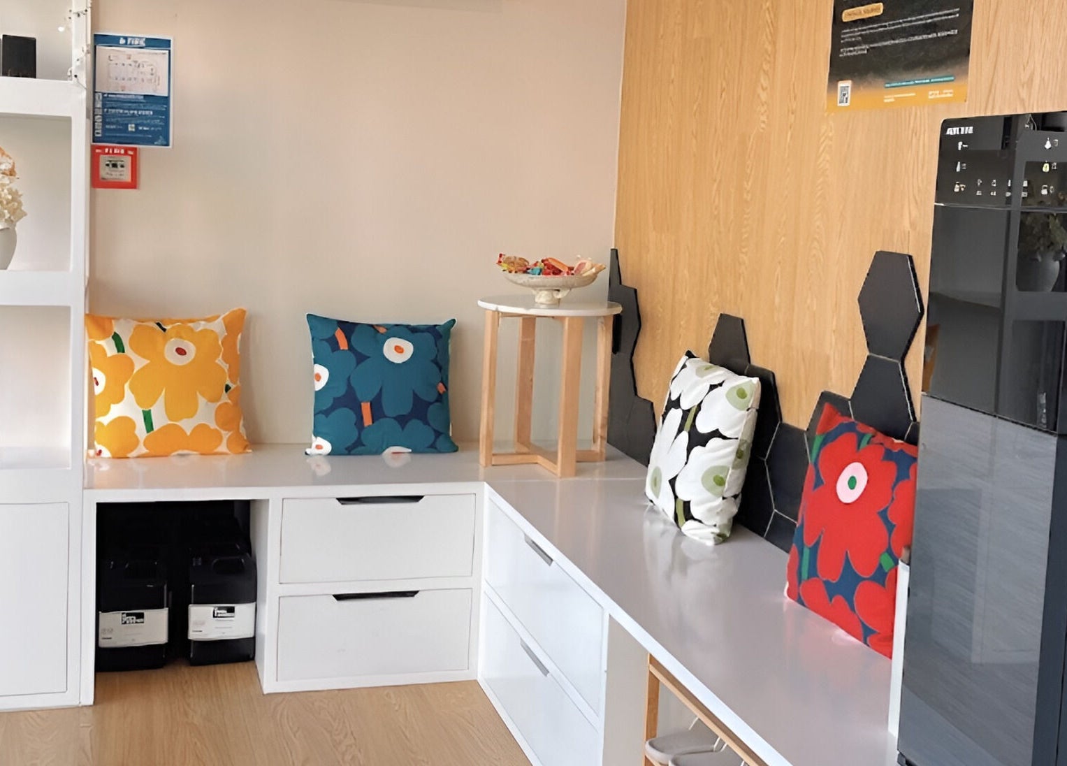 Cozy seating area at Relaxury, Auckland, Auckland, NZ featuring colorful cushions and modern decor.