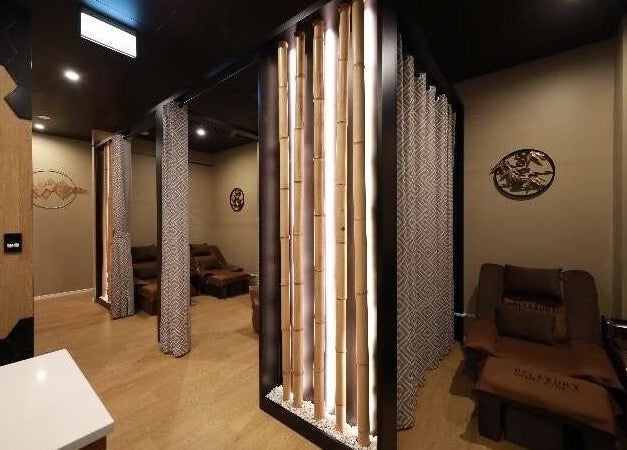 Elegant relaxation area at Relaxury, Auckland, Auckland, NZ showcasing a serene bamboo-themed decor.