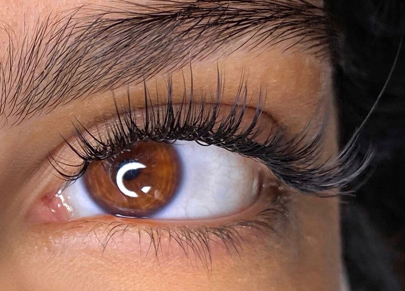 Close-up of expertly styled eyelashes at Beauty Hunters The Pearl, Doha, QA.