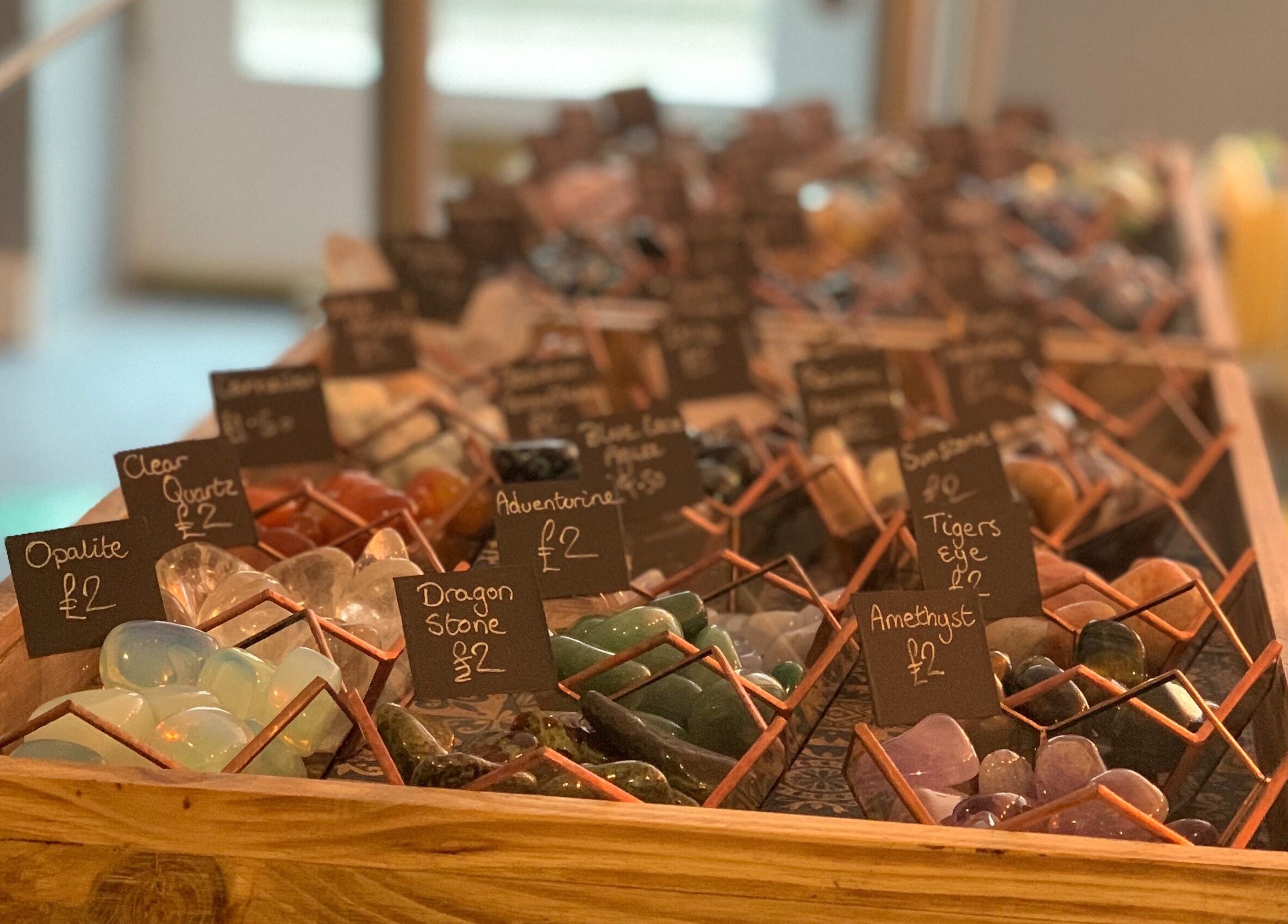 Colorful crystal stones displayed at The Avalon Rooms, Witney, England, GB for beauty and wellness.