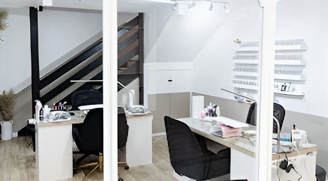 Contemporary nail salon interior at Justinas Nails, Truro, England, GB featuring modern workstations.