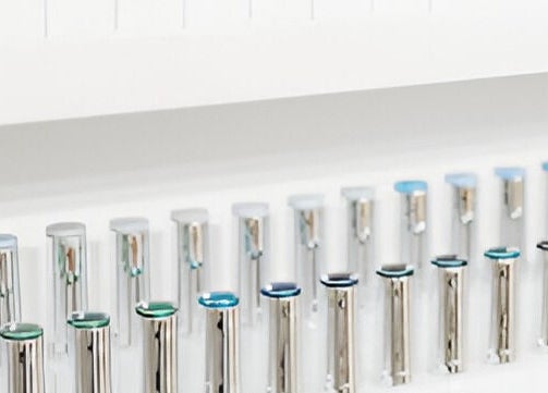 Colorful nail polish collection on display at Justinas Nails, Truro, England, GB.