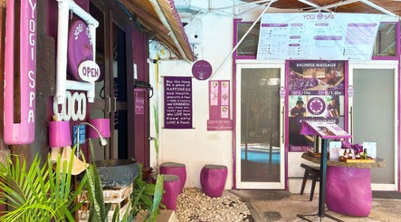 Yogi Spa entrance with vibrant decor in Bali, Bali, ID, showcasing welcoming ambiance and massage offerings.