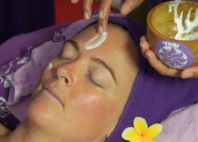 A soothing facial treatment at Yogi Spa, Bali, Bali, ID, showcasing a relaxing environment and expert care.