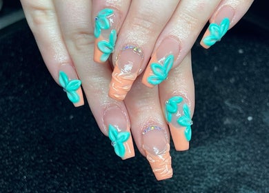 Stunning turquoise floral nail art at Tegan Maree Beauty, Orange, New South Wales, AU. Perfect for a chic look.