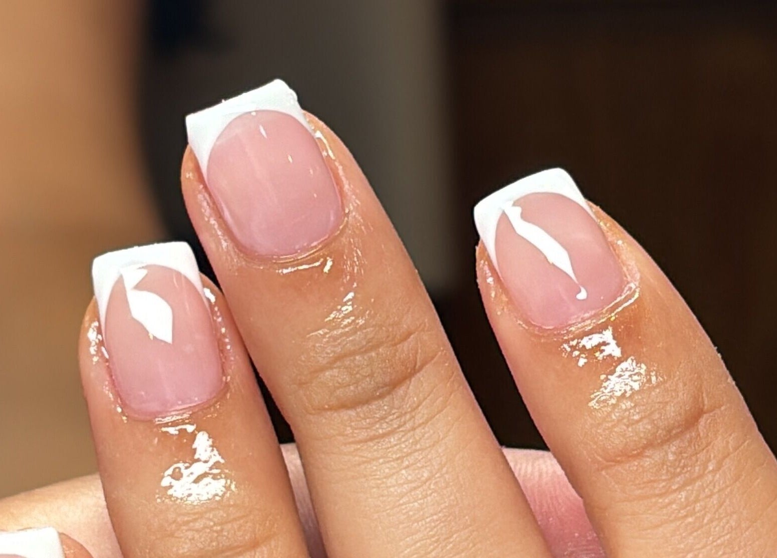 Elegant French manicure nails by Slayed by NHI in Glen Mills, Pennsylvania, US, showcasing glossy nail art.