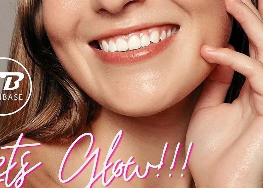 Close-up of a woman's radiant smile at Beauty by Caroline, Silsoe, England, GB.