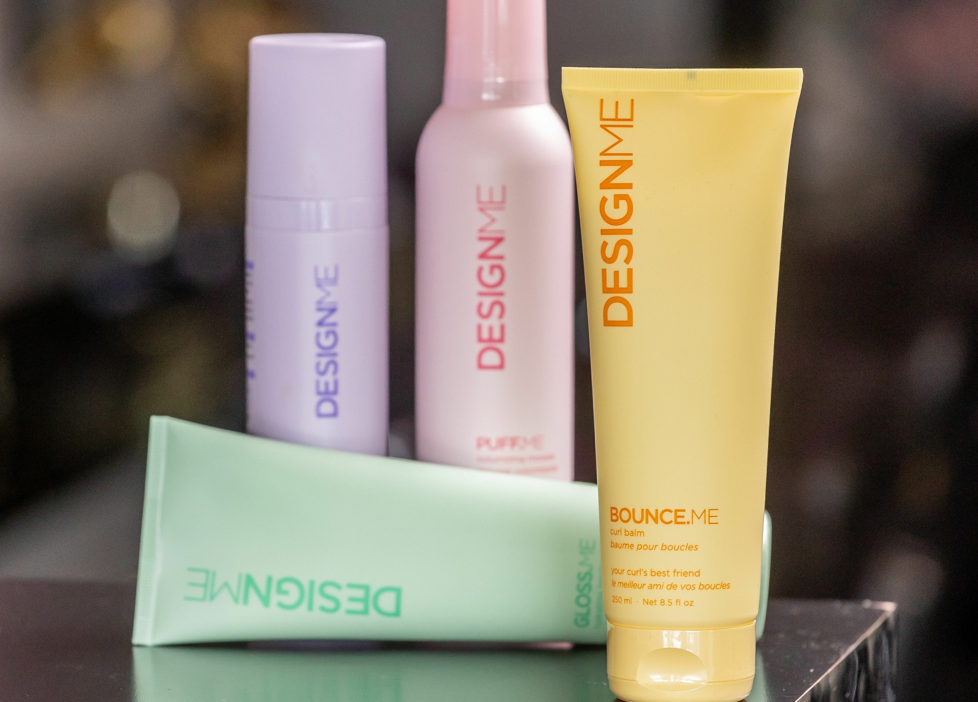 Display of colorful hair care products at Lolo's Salon in Laval, Québec, CA, showcasing modern beauty essentials.