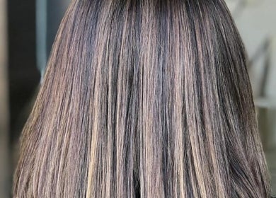 Smooth, professionally styled hair at Passion Salon and Spa (Victoria Ave East) in Regina, Saskatchewan, CA.