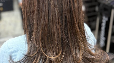 Styled brunette layers at Passion Salon & Spa (Hill Avenue), Regina, Saskatchewan, CA.