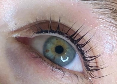 Close-up of enhanced eyelashes at That Glow, Melbourne, Victoria, AU, showcasing detailed beauty work.