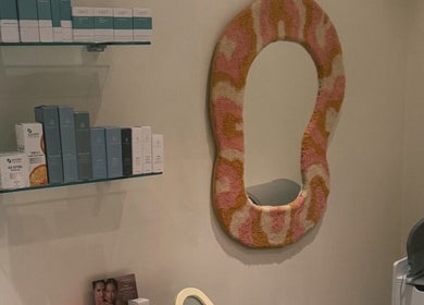 Luxurious skincare display and arty mirror at That Glow, Melbourne, Victoria, AU.