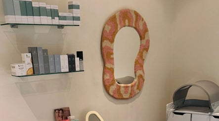 Stylish beauty nook at That Glow in Melbourne, Victoria, AU with unique mirror and skincare products.