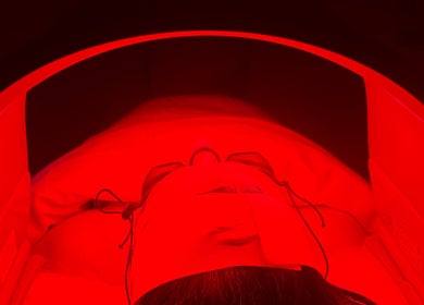 Red light therapy session at That Glow, Melbourne, Victoria, AU, enhancing skin wellness and relaxation.