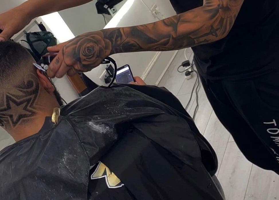 Intricate star hair design at 5 Star Barbers - Jay, Erith, England, GB, showcasing skilled barbering.