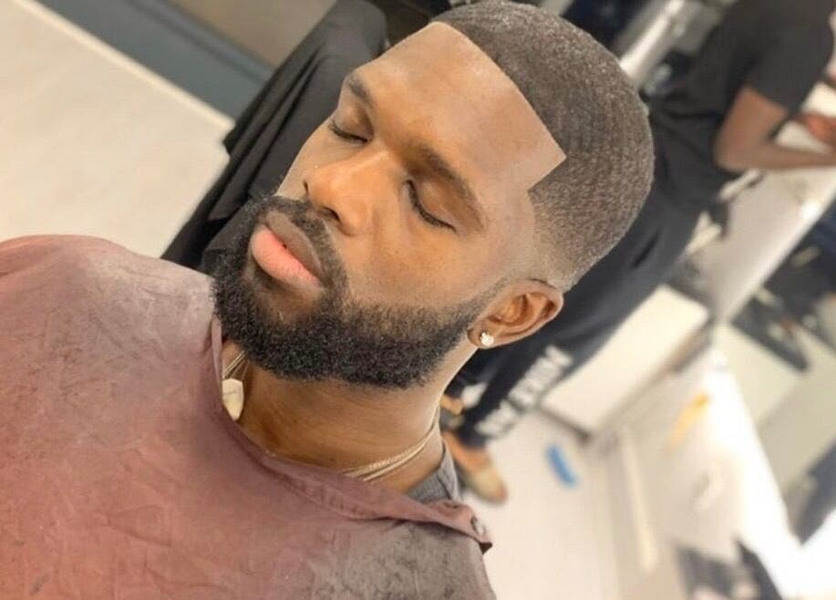 Stylish beard trim at 5 Star Barbers - Jay in Erith, England, GB. Experience top-notch grooming and relaxation.