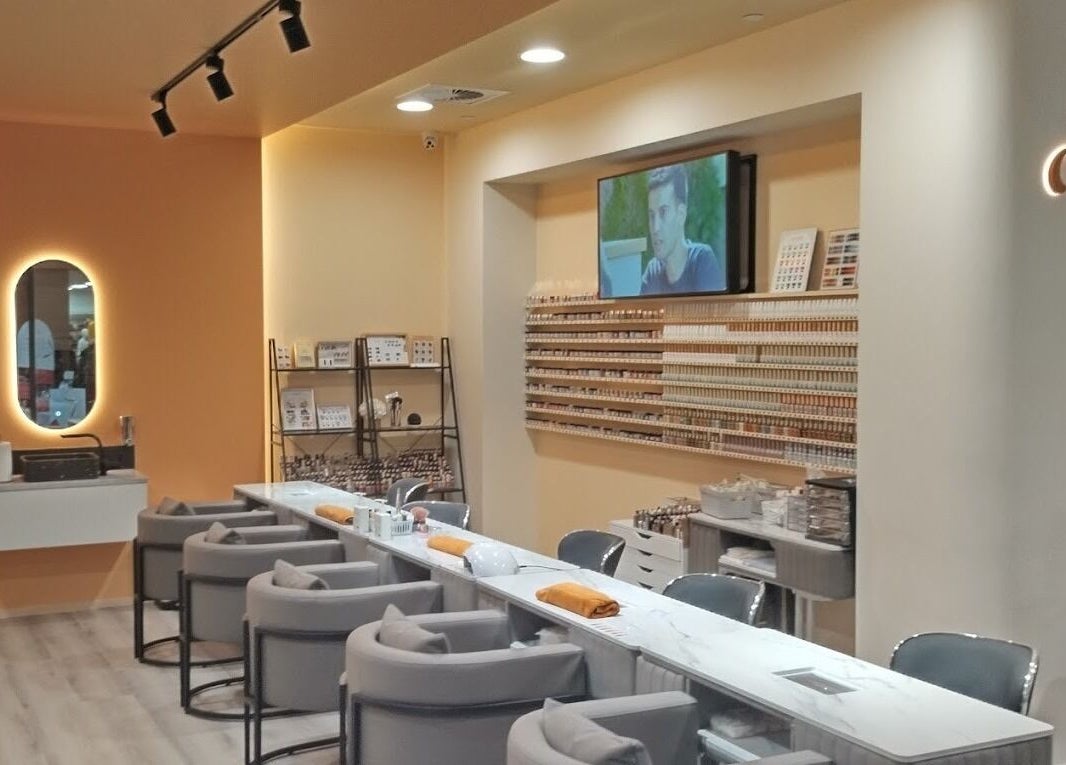 Chic interior of Vivi Salon Innaloo, a beauty haven in Innaloo, Western Australia, AU, with plush seating and products.