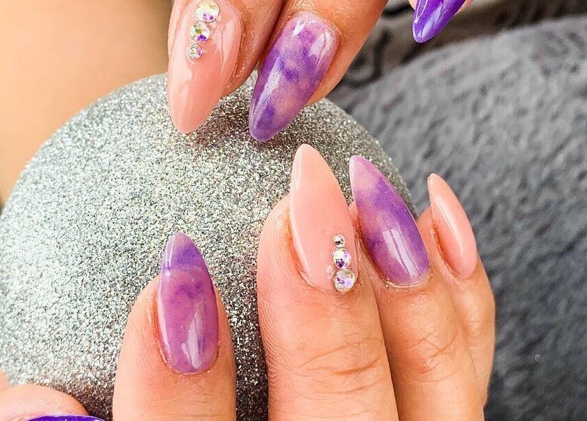 Stylish purple and pink nails with rhinestones at Vivi Salon Innaloo, Innaloo, Western Australia, AU.
