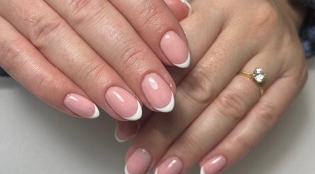 French manicure nails by By Melanie in Solihull, England, GB, featuring a natural pink base with white tips.