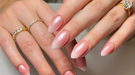 Elegant pink almond-shaped nails at By Melanie, Solihull, England, GB, showcasing exquisite manicure artistry.