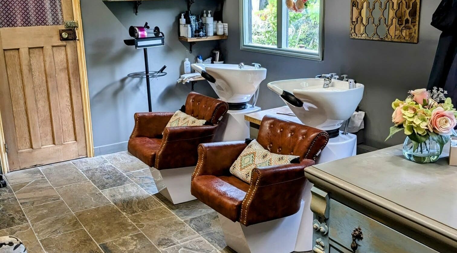 Elegant wash stations and leather chairs at The Mane House, Biddenden, England, GB.