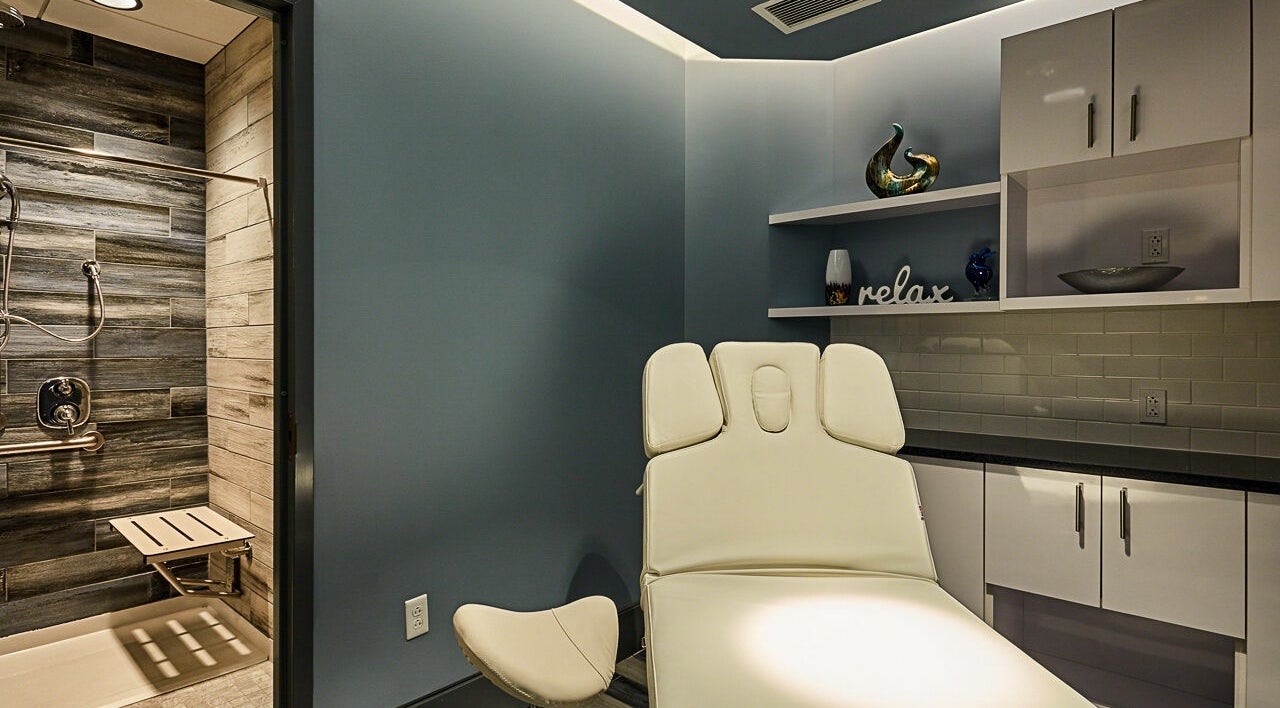 Serene treatment room at Infinity Spa Nails in Reston, Virginia, US, featuring a comfortable spa chair.