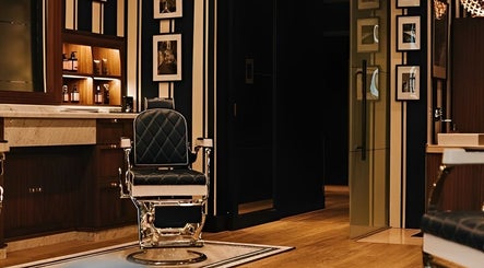 Luxurious interior of Barberia Italiana Grooming Lounge Ltd. in Dubai, Dubai, AE with leather barber chair.
